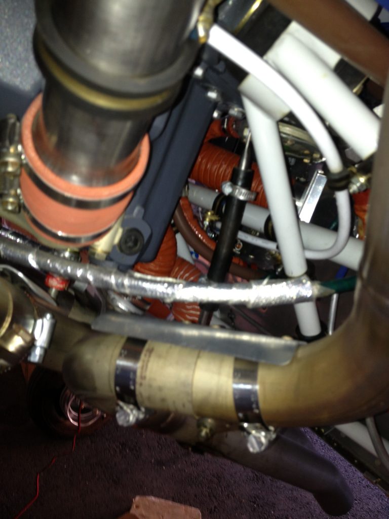 Heat shield on throttle cable